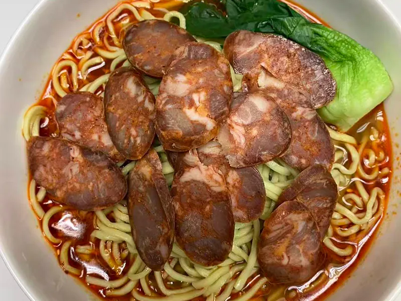 Smoky sausage noodle soup at Liuji Szechuan Noodle House BK, a Chinese Restaurant in New York